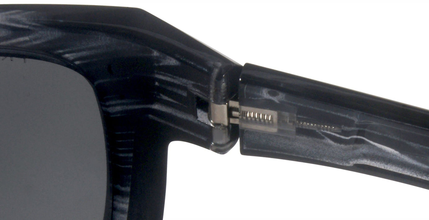 Macro view of ComfortFlex hinge on black-gray PROGEAR® U-1503 sunglasses, engineered for flexibility and long-lasting wear.