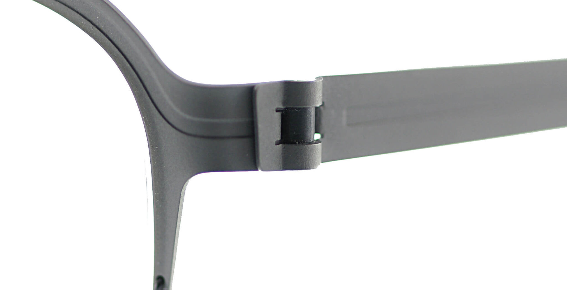 Close-up of Free Form Eyewear™ Titanium FFA934 screwless hinge in matte black, showcasing German-engineered lightweight 14g half-frame design.