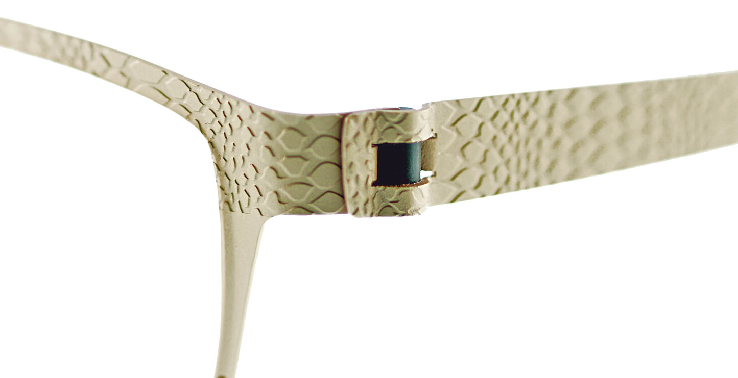 Close-up of Free Form Eyewear™ Titanium 14g feather-light eyeglasses hinge with textured snake-scale pattern in luxury German design. Screwless titanium frame ensures durability and comfort for men and women.
