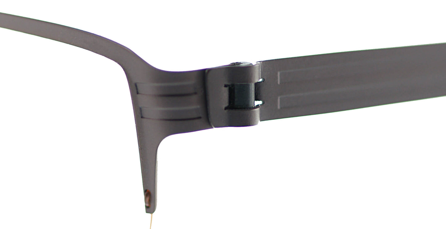 Close-up of Free Form Eyewear™ FFA933 titanium eyeglasses hinge showing screwless German-engineered design in lightweight 14g half-frame style.