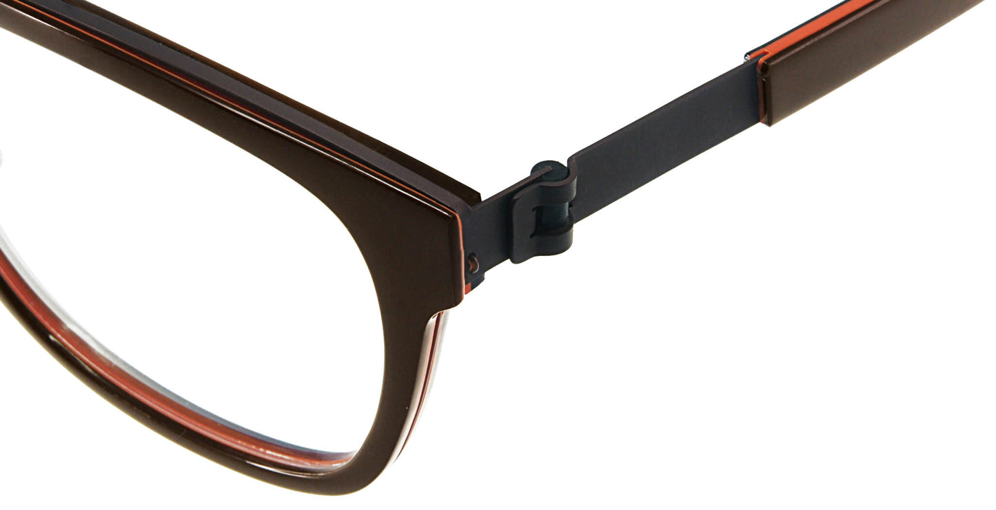 Close-up of Free Form Eyewear™ Model FFA984 in green, showing luxury German design with screwless titanium hinge and full-rim lightweight frame.