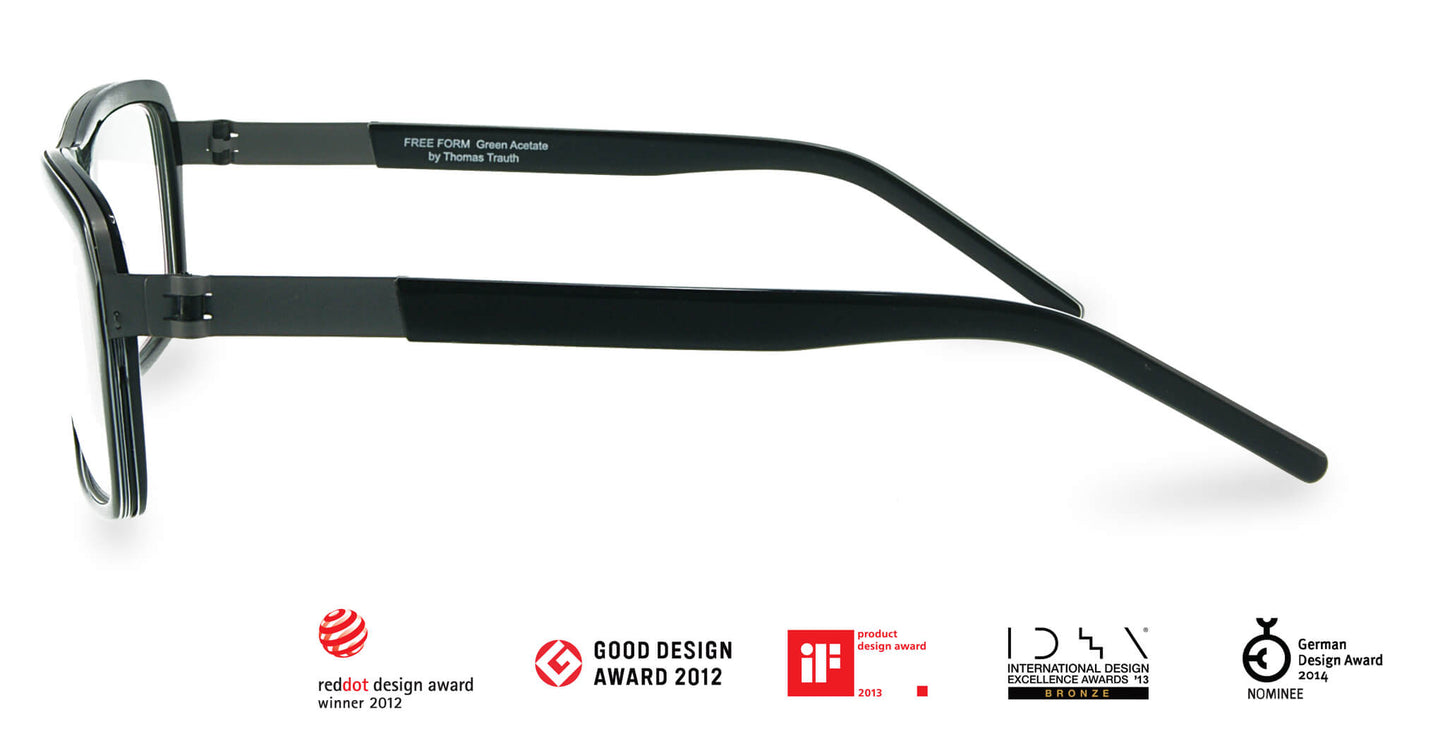 Side view of Free Form Eyewear™ Titanium 14g feather-light eyeglasses model FFA985 in green acetate with black temples, showcasing luxury German design and screwless hinge innovation.
