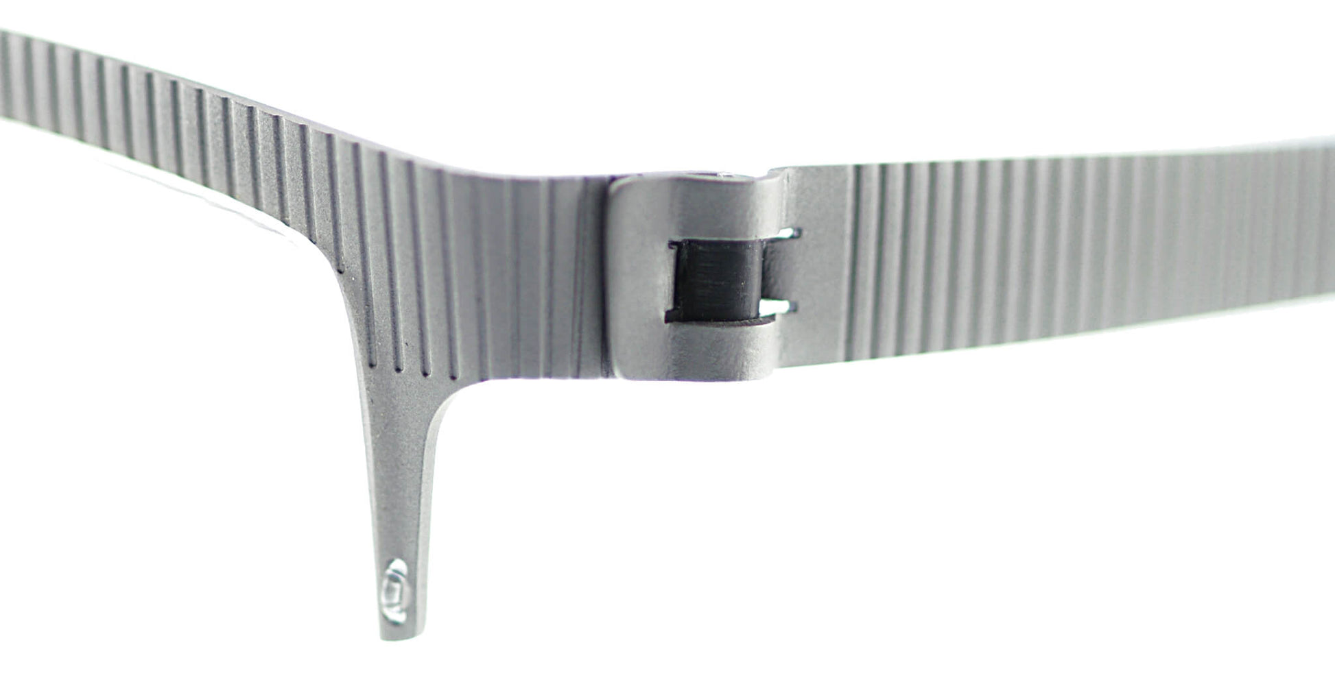 Close-up of Free Form Eyewear™ Model FFA932 titanium eyeglasses hinge showing screwless German design. Lightweight 14g half-frame in green finish.