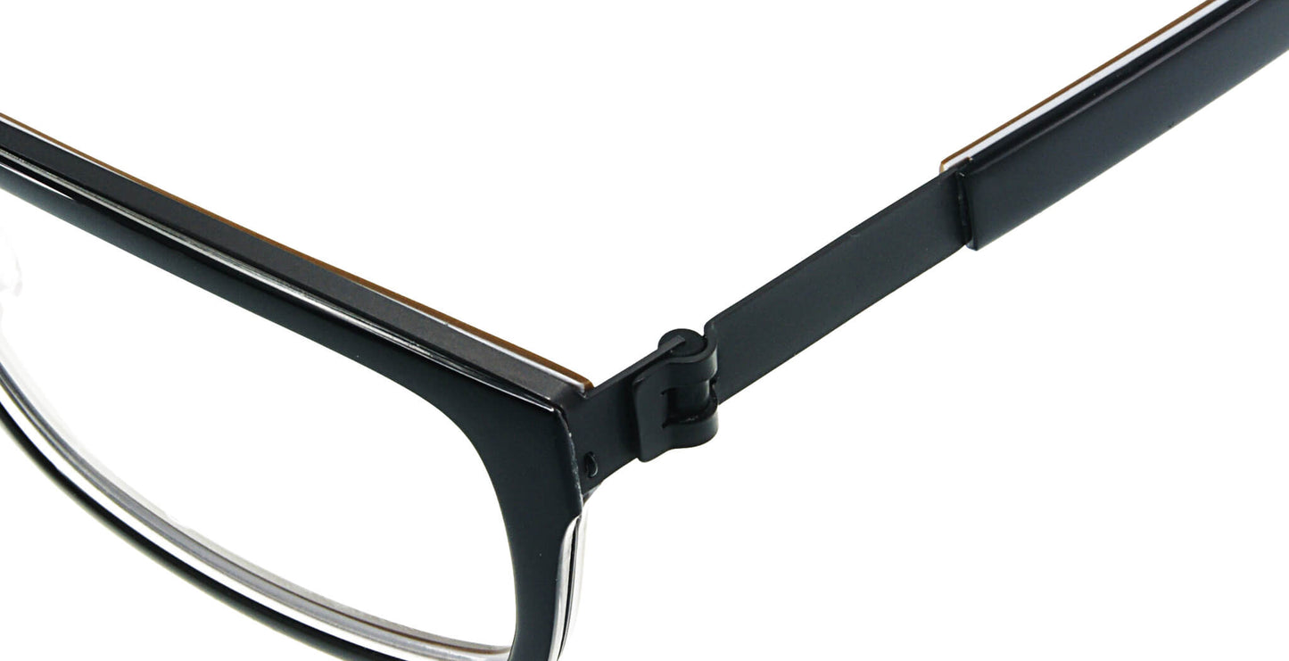 Close-up of Free Form Eyewear™ Model FFA986 titanium eyeglasses hinge in black, showcasing screwless German design for lightweight durability.