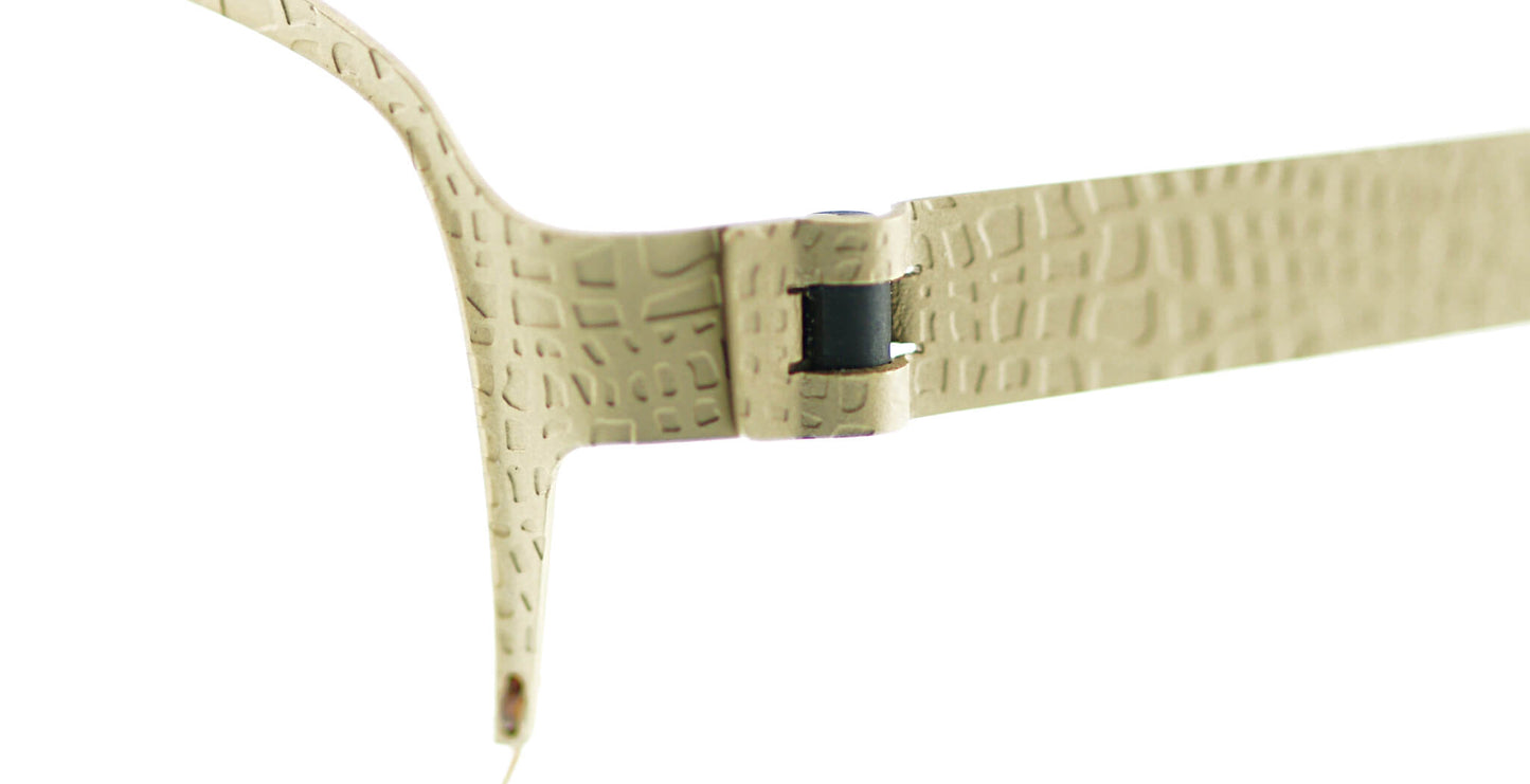 Close-up of Free Form Eyewear™ Titanium 14g feather-light eyeglasses in green with textured half frame and screwless hinge. Luxury German design for men and women.