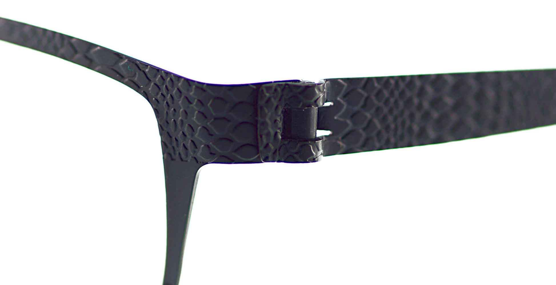 Close-up of Free Form Eyewear™ Titanium FFA935 half-frame glasses in green with textured snake-skin pattern and screwless hinge design. Lightweight 14g luxury German-engineered frame for men and women.