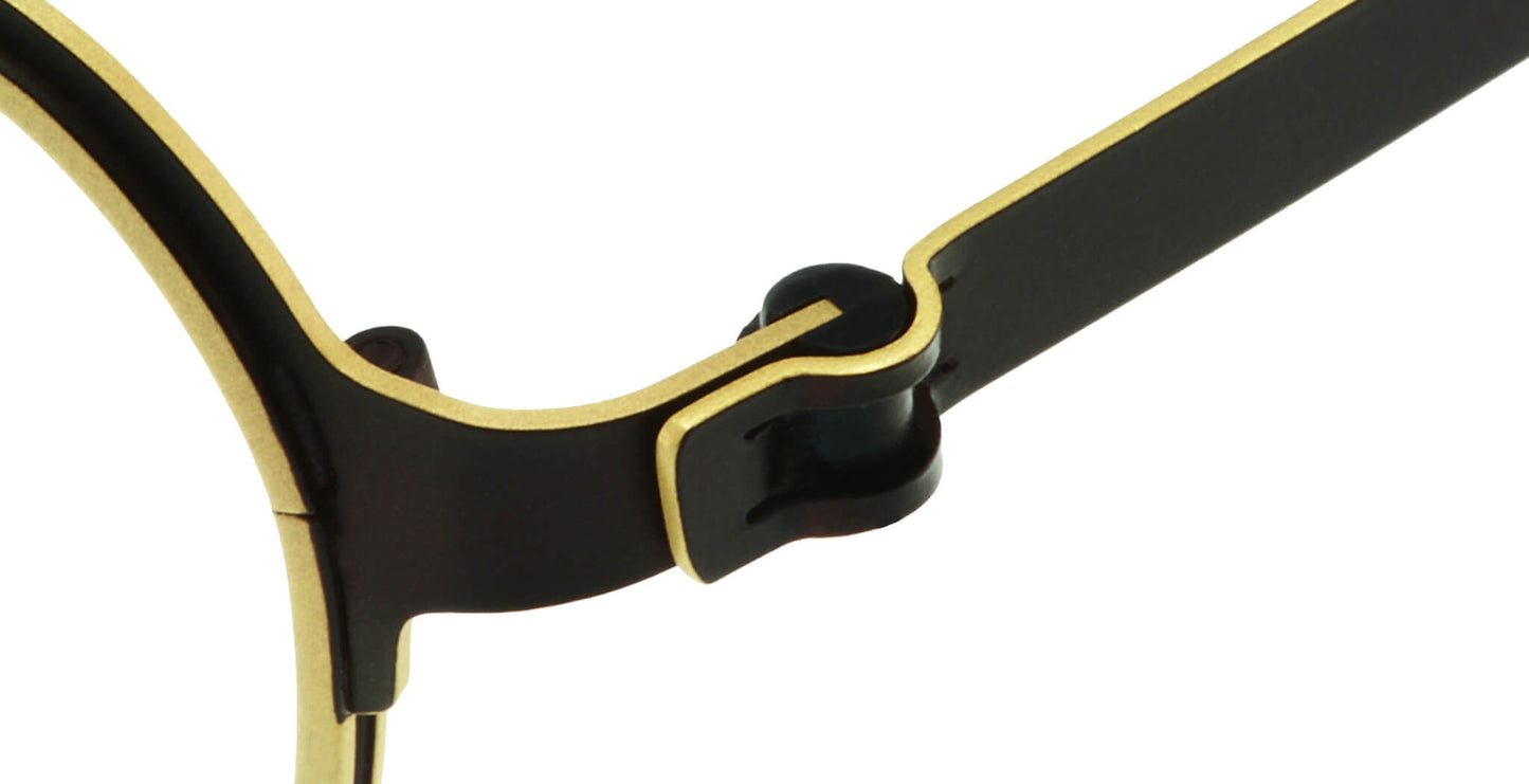Close-up of Free Form Eyewear™ Titanium 14g luxury eyeglasses hinge in green and gold, showcasing screwless German design for lightweight comfort.
