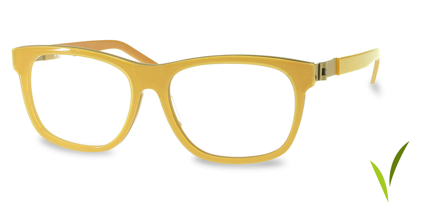 Free Form Eyewear™ FFA983 full-rim titanium glasses in vibrant green-yellow tone, featuring ultra-light 14g frame and screwless German design.
