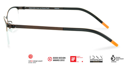 Free Form Eyewear™ Titanium 14g feather-light eyeglasses in green half-frame design with screwless hinges and orange temple tips. Luxury German-engineered unisex glasses ideal for strong prescriptions and all-day comfort.