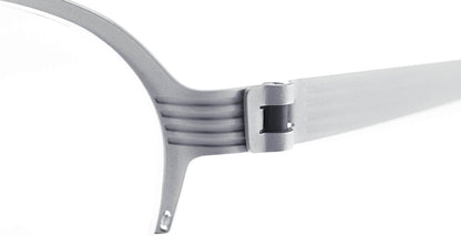 Close-up of Free Form Eyewear™ Titanium 14g luxury eyeglasses hinge, showcasing screwless German-engineered design in lightweight silver half frame.