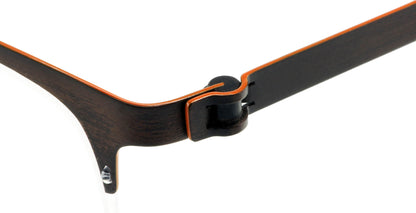 Close-up of Free Form Eyewear™ FFA916 titanium eyeglasses hinge in green half-frame design. Features screwless German-engineered lightweight frame.