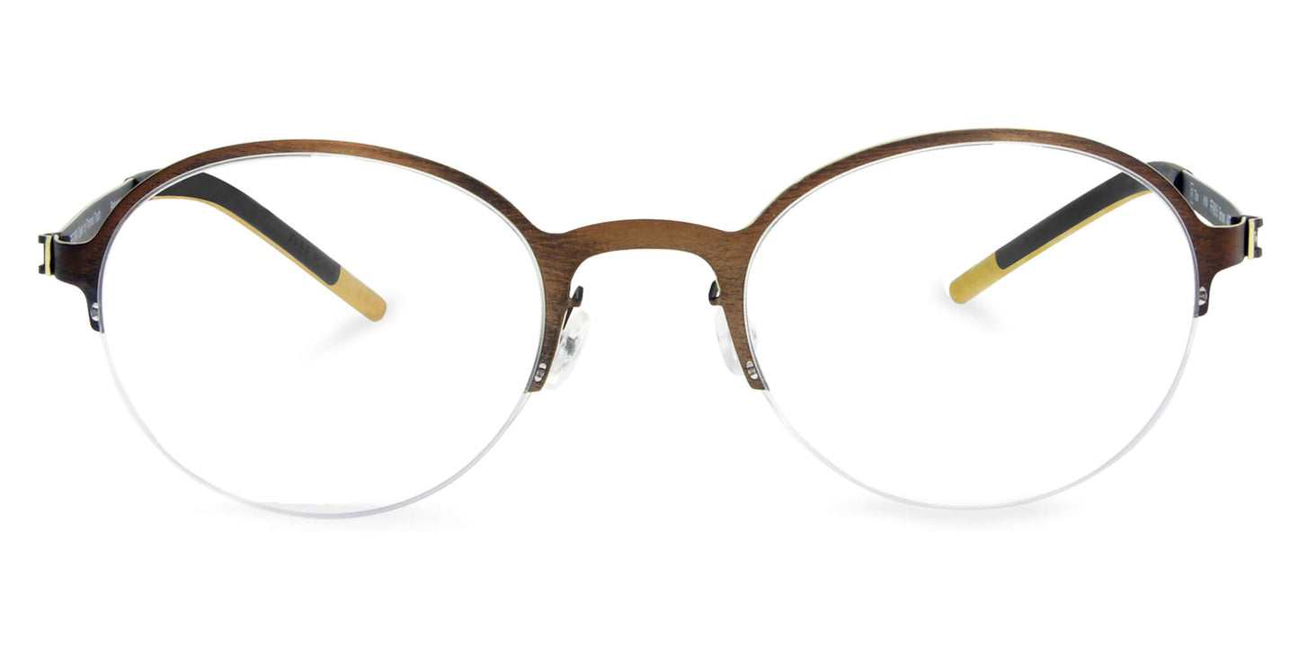 Free Form Eyewear™ Titanium 14g feather-light eyeglasses in green half-frame design with round lenses and screwless German-engineered hinges. Luxury unisex titanium glasses for blue light protection and strong prescriptions.