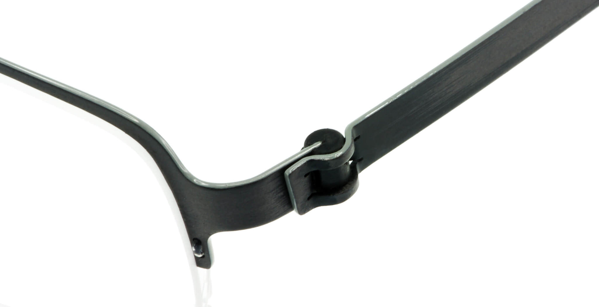 Close-up of Free Form Eyewear™ FFA904 green titanium half-frame glasses showcasing screwless hinge design. Lightweight 14g luxury German engineering.